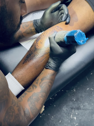 Work by Bomb Tattoo Shop