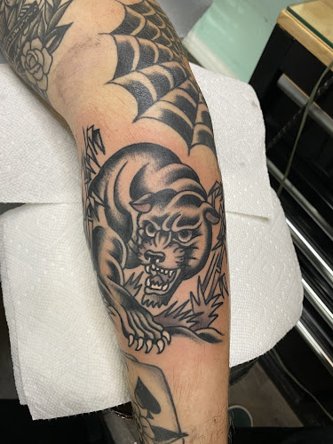 Work by Lucky You Tattoos