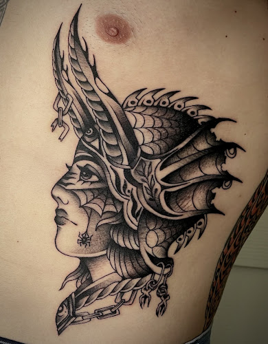 Work by Midgard Tattoo Company