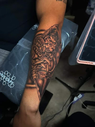 Work by No Ragrets Tattoo & Piercing Studio