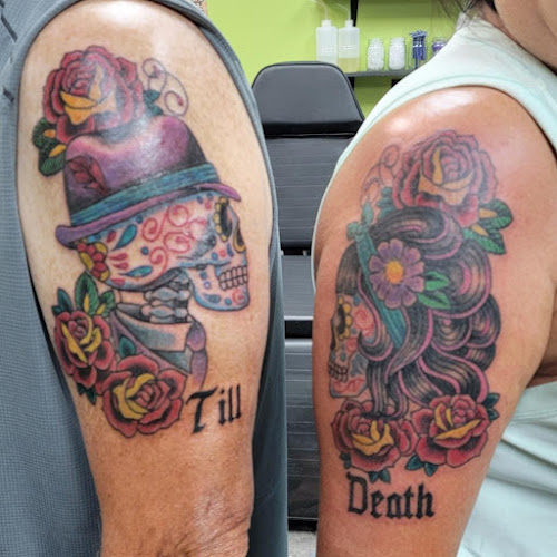 Work by Smokin' Gun Tattoos