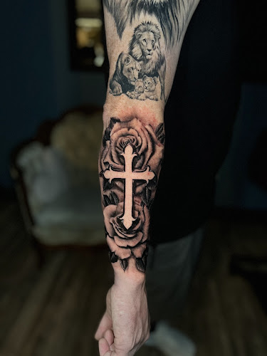 Work by The Kingdom Tattoo Company