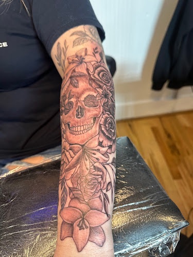 Work by Blue Moon Tattoo & Body Piercing