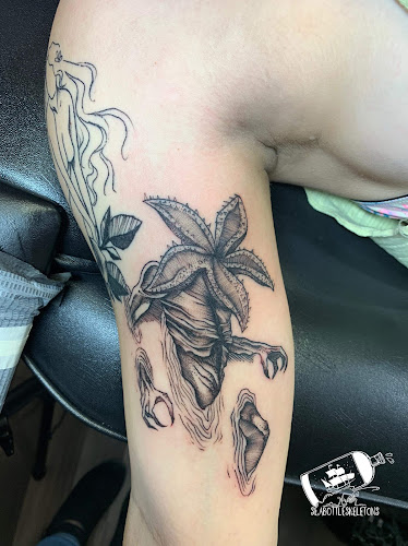 Work by Dark Horse Tattoo and Piercing