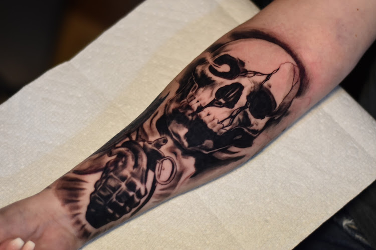Work by Requite Tattoo, LLC