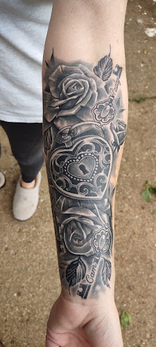 Work by Studio Ink Tattoo and Body Piercing