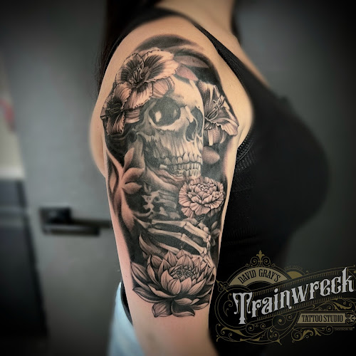 Work by Trainwreck Tattoo Studio