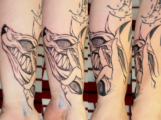 Work by Snake Way Tattoo