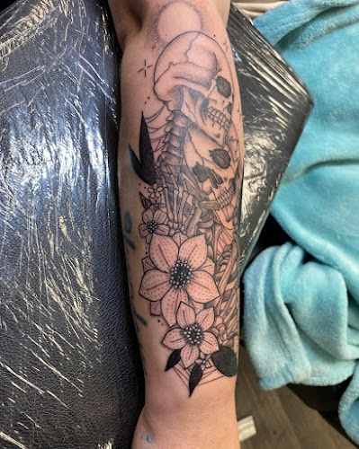 Work by Scarlet Ink Tattoo Studio
