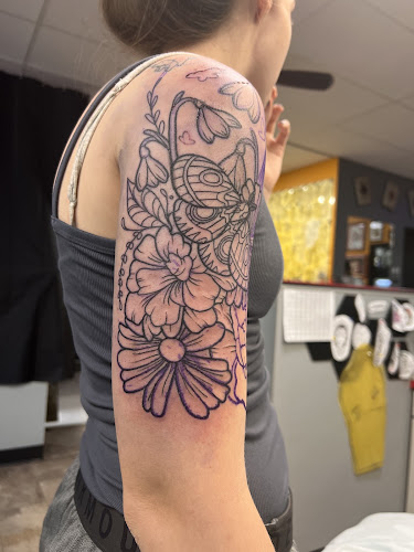Work by Aces Tattoos