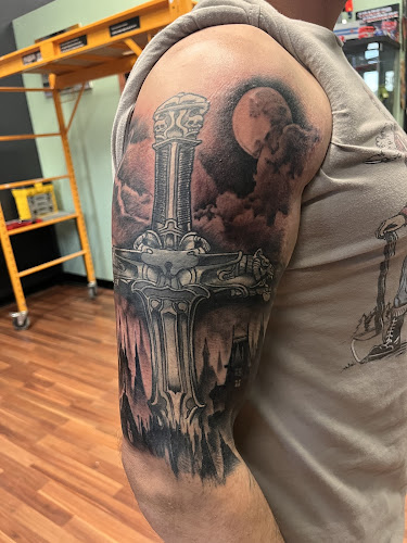 Work by Cybertron Tattoo Studio