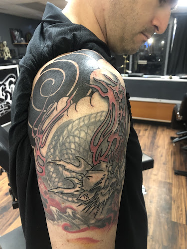 Work by Inkaholics tattoo company