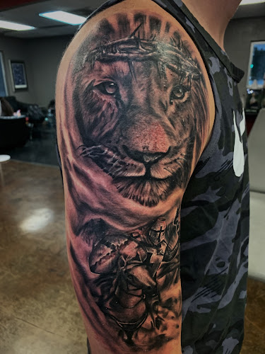 Work by Smilin Rick's Tattoo