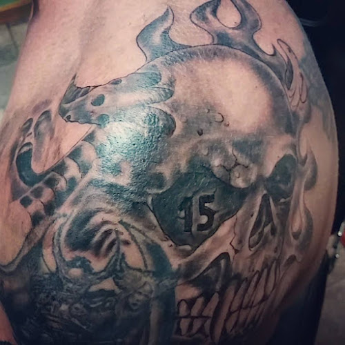 Work by Wayne's Tattoo World