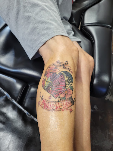 Work by Electric Diamond Tattoo