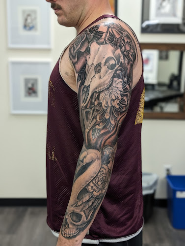 Work by 9 Lives Tattoo
