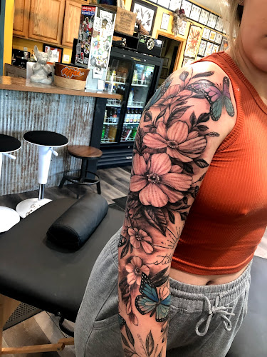Work by Gitchee Gumee Tattoo