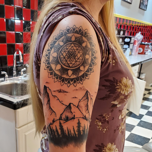 Work by Artistic Creations Tattoo & Removal