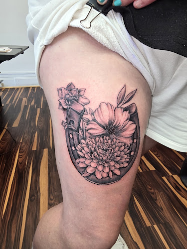 Work by Tigers paw tattoo company