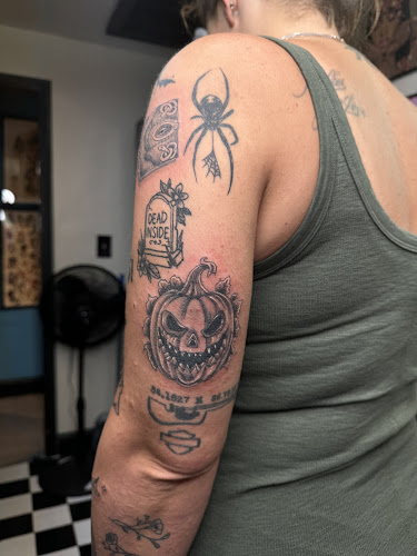 Work by Fine Line Tattoo Studio