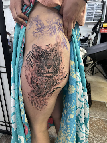 Work by Doulos Tattoo, The Tattoo Shop