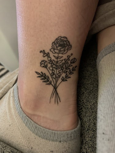 Work by June Bug Tattoo