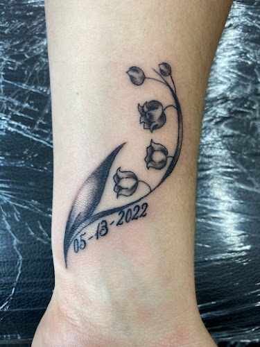 Work by Sharpshooters Tattoo