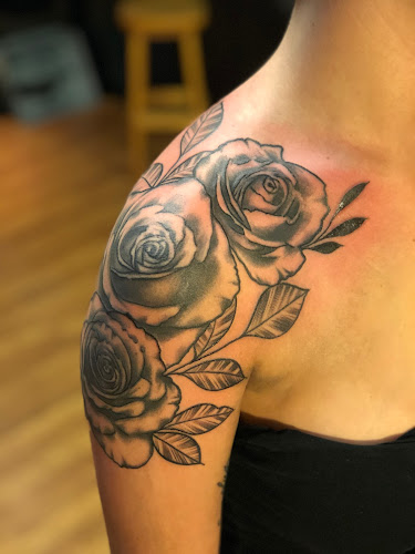 Work by Midnight Ink Tattoo Parlor