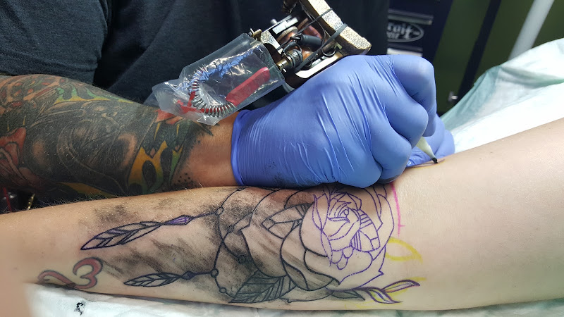 Work by Splash of Color Tattoo & Piercing Studio