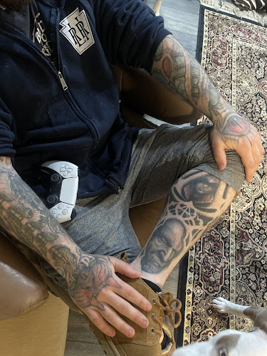 Work by Cow Harbor Tattoo and Art