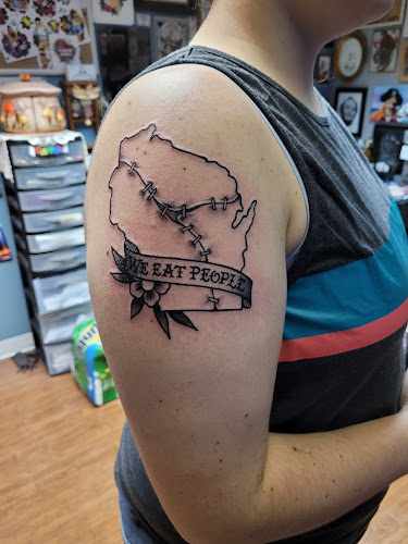 Work by Artisan Tattoo