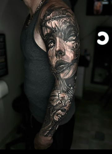 Work by Blue Dragon Tattoo EC