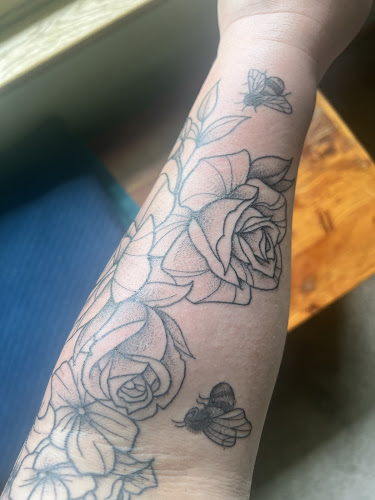 Work by Gold Snake Tattoo