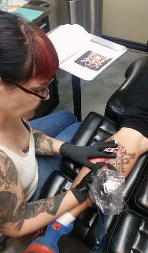 Work by 15th Legion Tattoo & Body Piercing