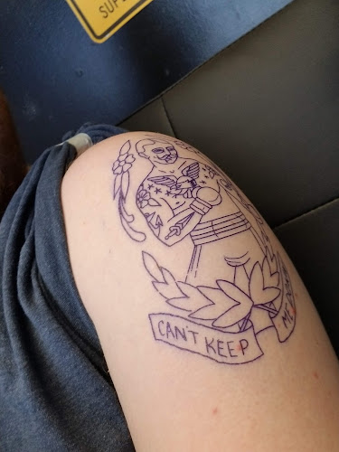 Work by Done -N- Cane Tattoo