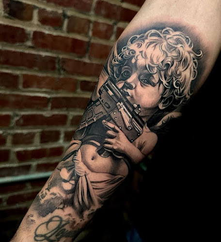 Work by Artillery Tattoo Studio