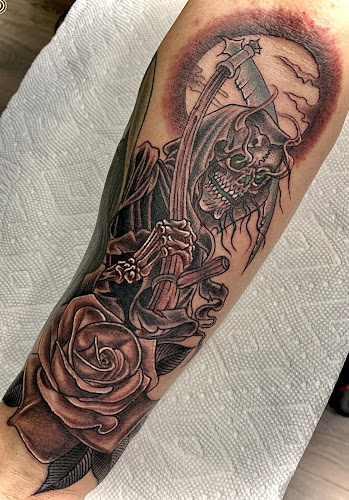 Work by Concrete Tattoos