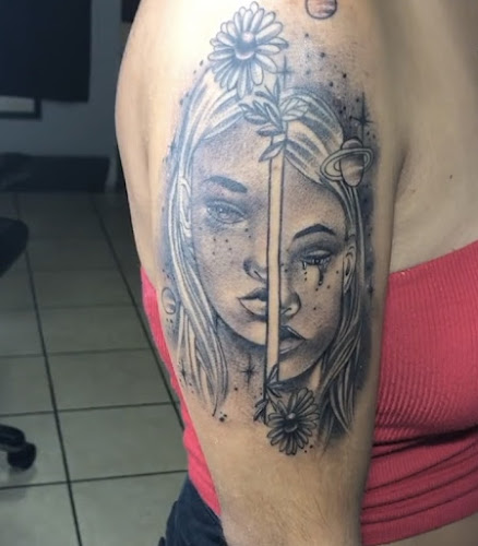 Work by Divine Light Tattoos
