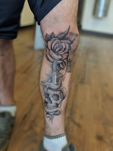 Work by EVL Ink Tattoo & Apparel