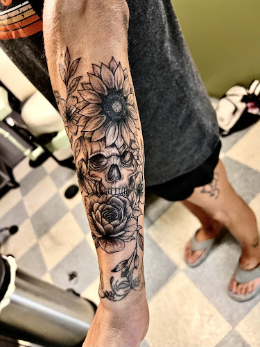 Work by Bluecifers Branded Tattoo
