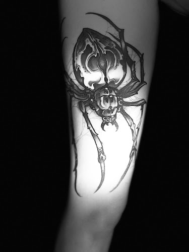 Work by Blood Oath Tattoo