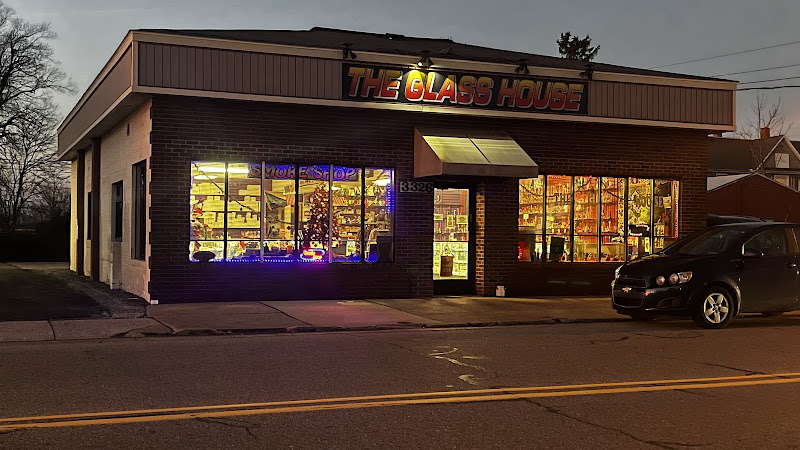 Work by The Glass House Erie Smoke Shop, Tattoo Supplies, Horror & Action Figure Collectibles