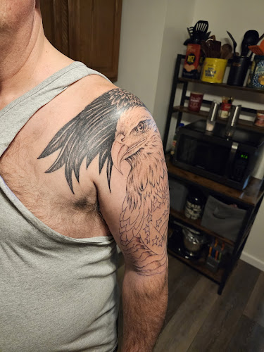 Work by Ēddie's Tattoo And Piercing Studio
