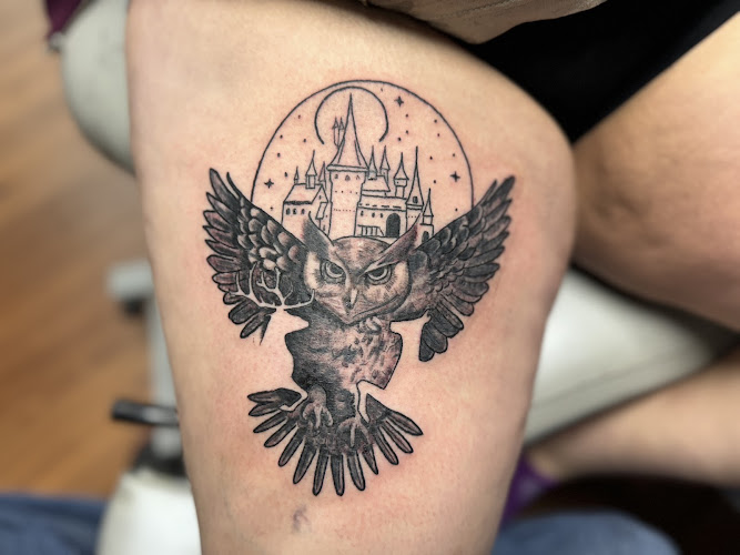 Work by Twisted Mad Hatter tattoo