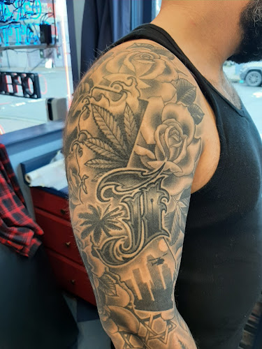 Work by Sailor's Grave Tattoo