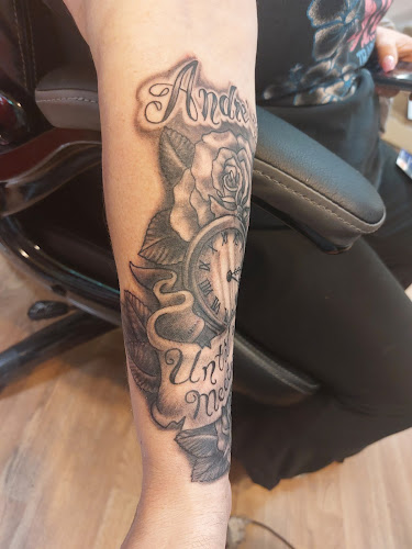 Work by Dragon Koi Tattoo