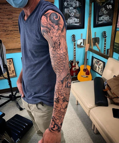 Work by Sunken Ship Tattoos