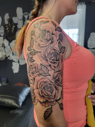 Work by Evergreen Tattoo Company