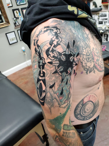 Work by Jurassic Ink Tattoo Co.
