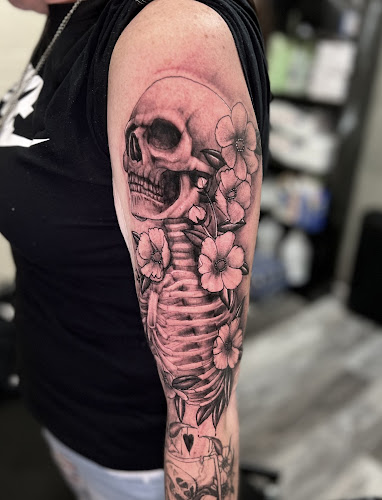 Work by Recovery Ink Tattoo Shop